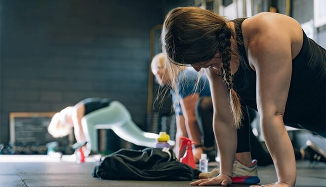 4 men and women pre workout stretching